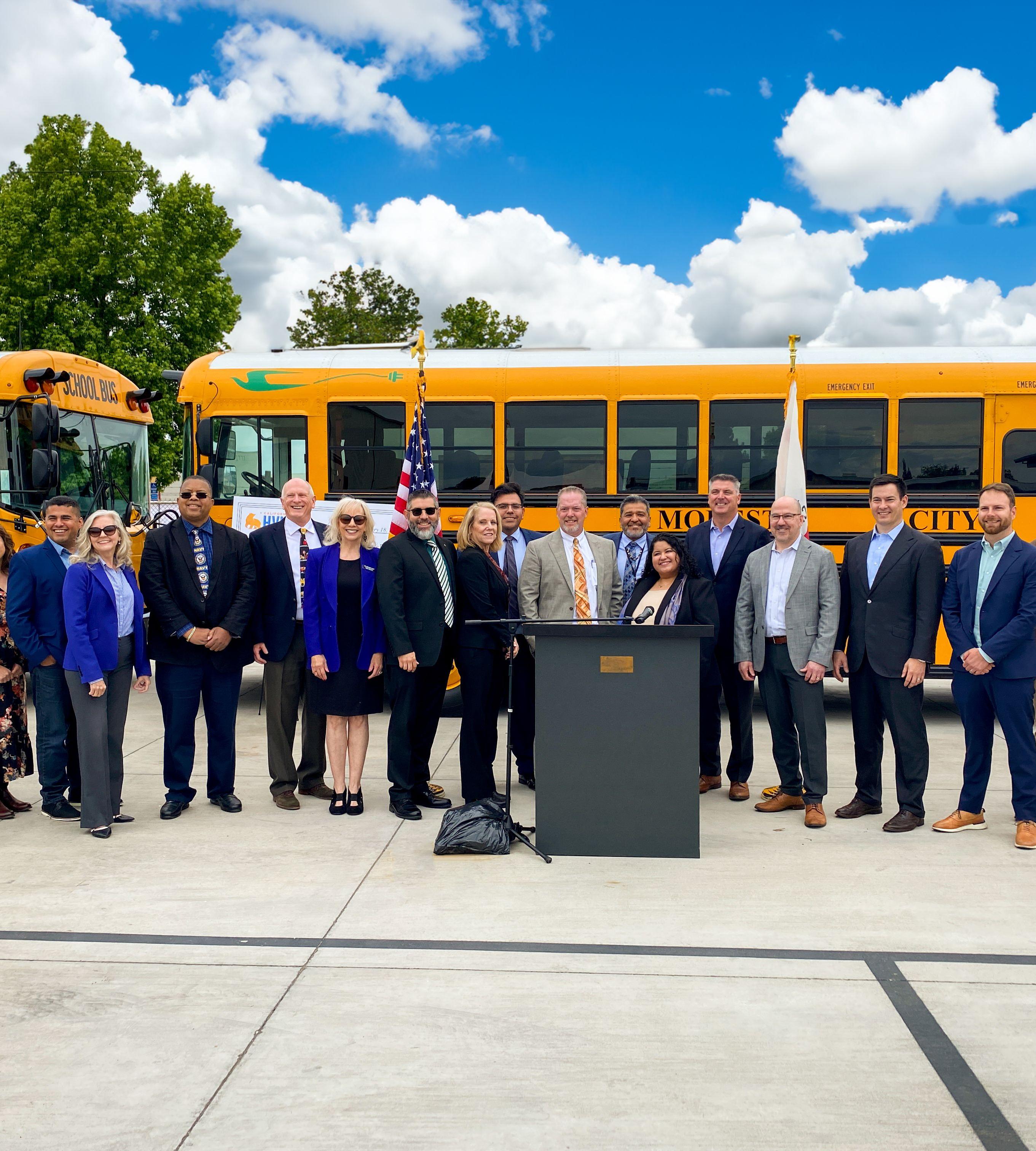 The Modesto School Team at electric school bus ribbon cutting event.